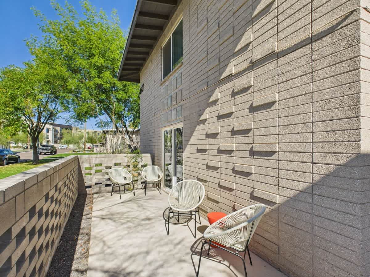 Private patio with outdoor seating.