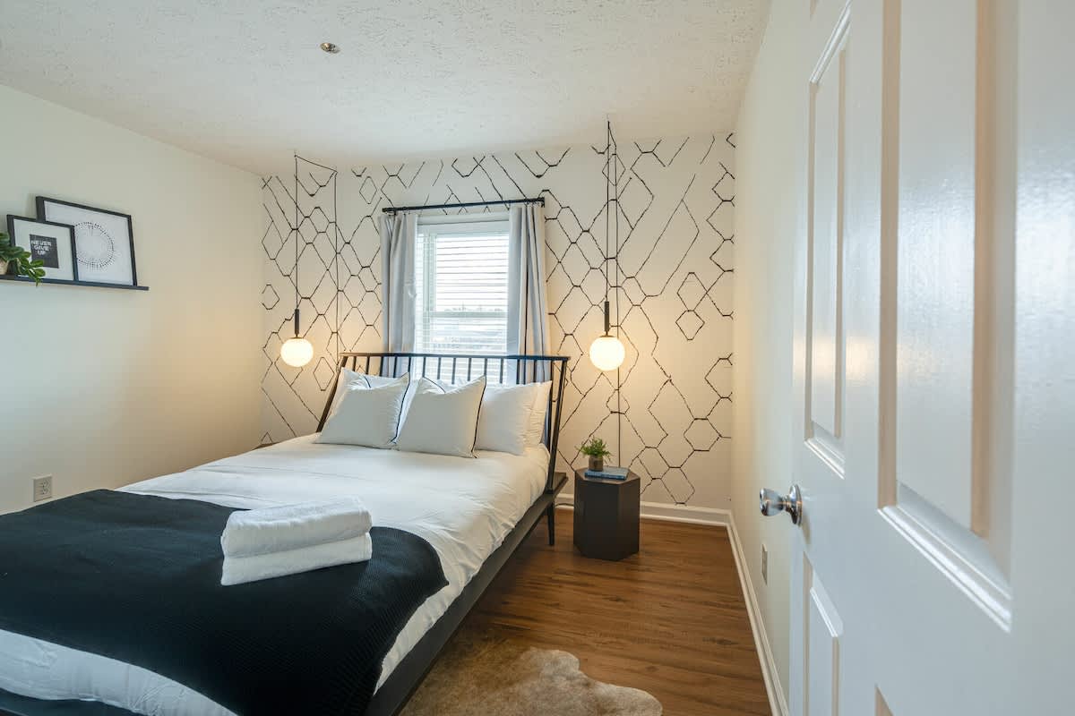 2nd bedroom with designer furnishings, and Queen bed.