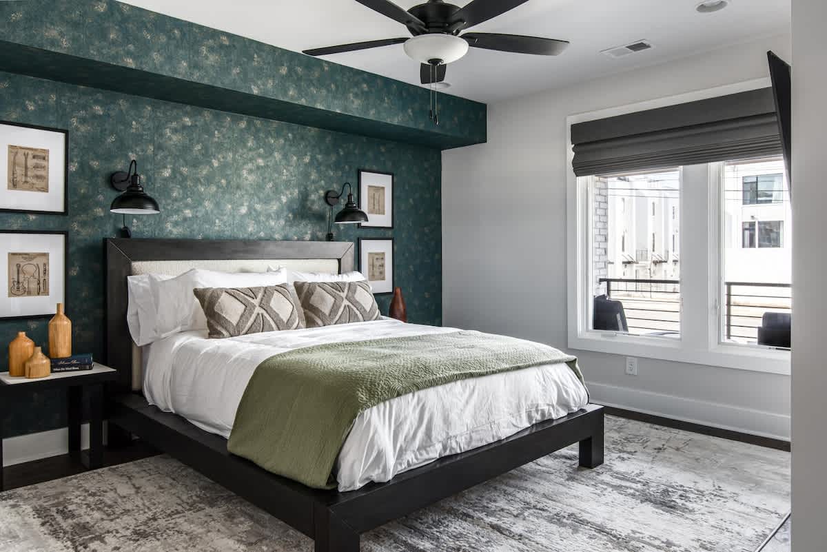 4th bedroom with flat screen TV and en-suite bathroom.