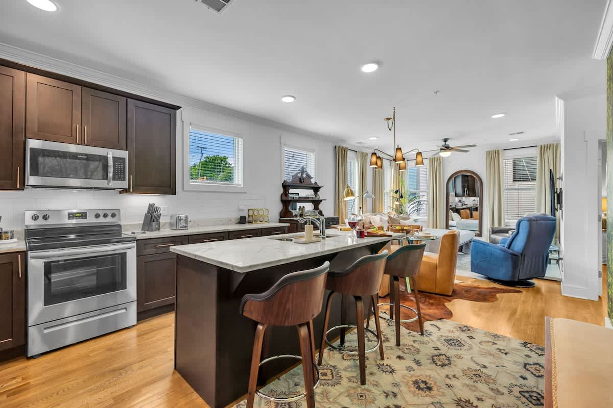 Open-concept living seamlessly integrates the fully equipped kitchen, dining, and living areas into one, keeping your group together and creating long-lasting memories.