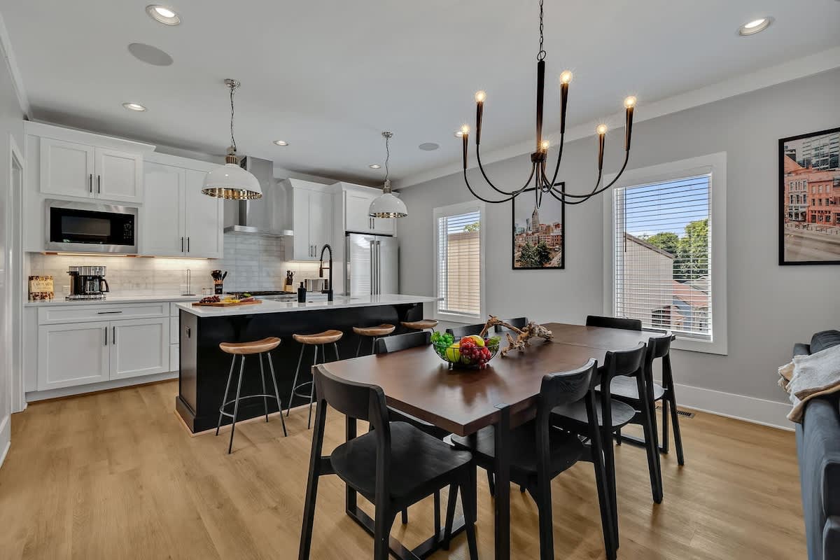 2nd Floor: Formal dining area featuring a large table set to accommodate 8 guests.