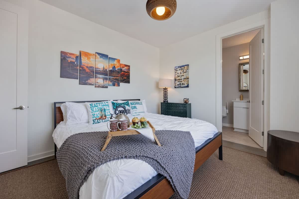 The primary bedroom has a King bed, a smart TV, and an en-suite bathroom. (3rd Floor)