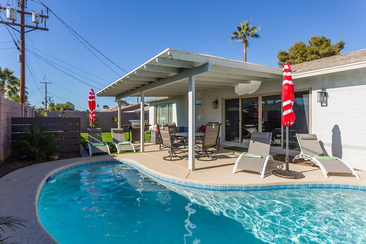 Private backyard with recently resurfaced private pool with brand new pool lights.