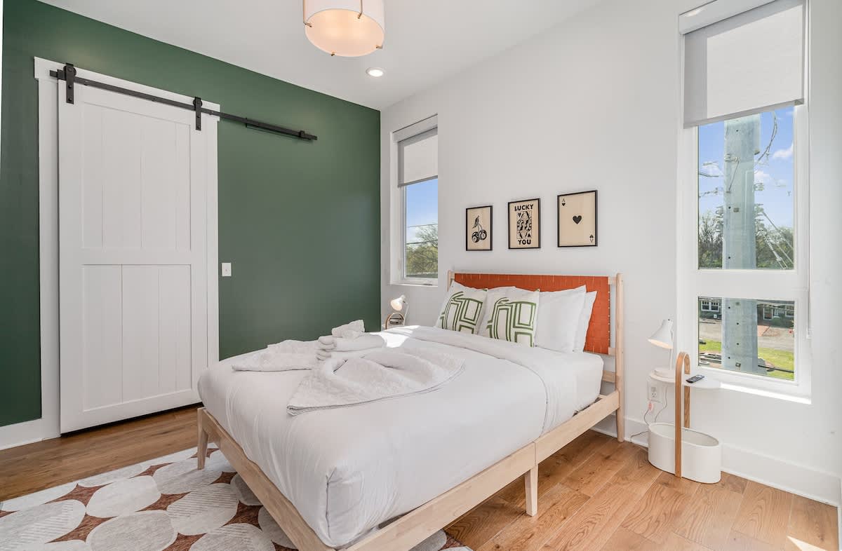 3rd bedroom with Queen bed, smart TV, closet space, and en-suite bathroom.