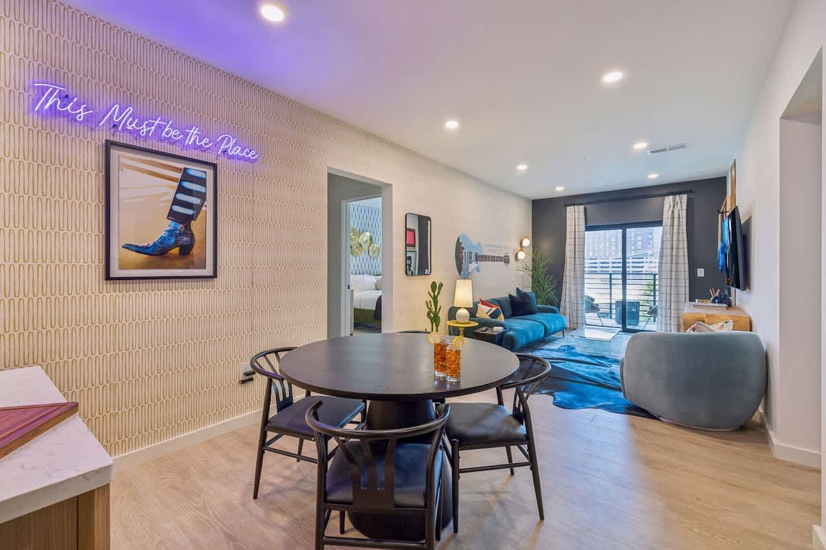Dining table set to accommodate up to four guests.