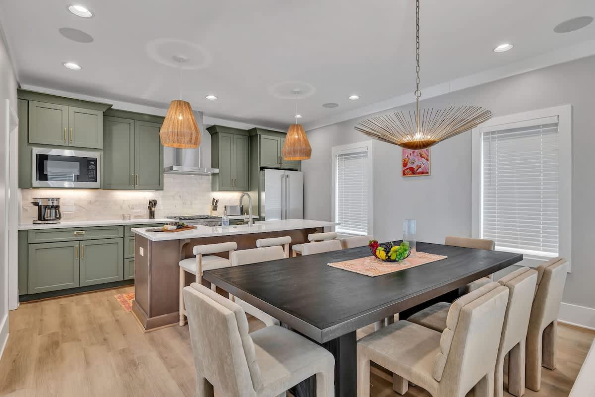 2nd Floor: Formal dining area featuring a large table set to accommodate 8 guests.