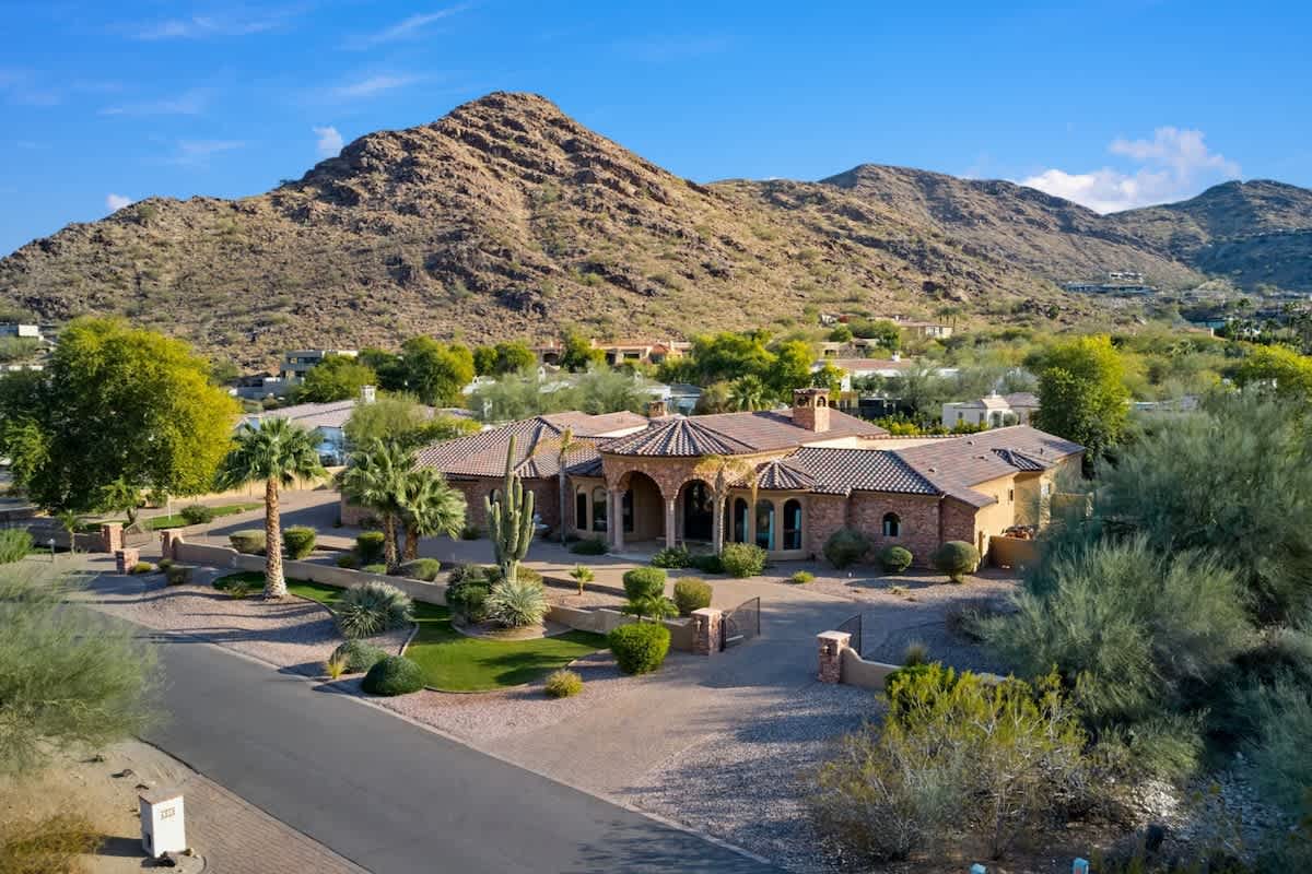 Breathtaking aerial views of the iconic Mummy Mountain, showcasing the beauty of Paradise Valley in all its glory!