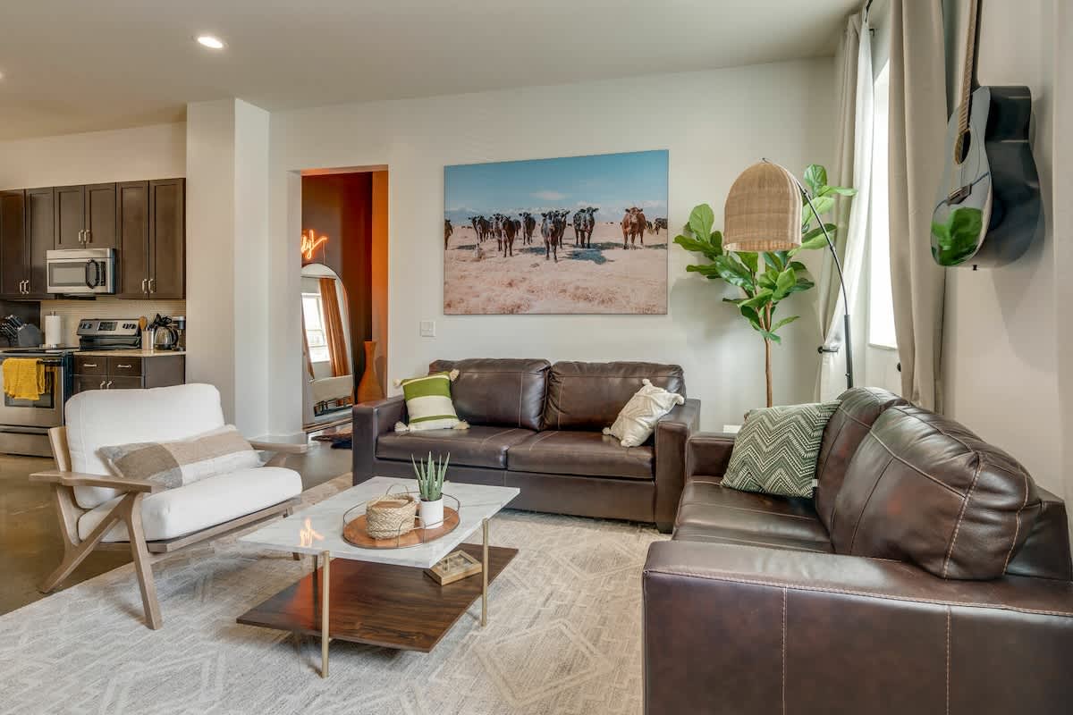 Bright and open living area with smart TV.