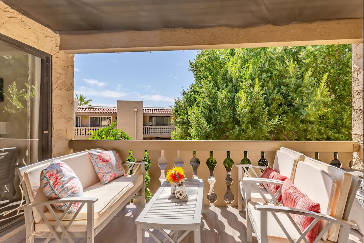 Beautiful private covered balcony perfect for enjoying a cup of coffee in the morning.
