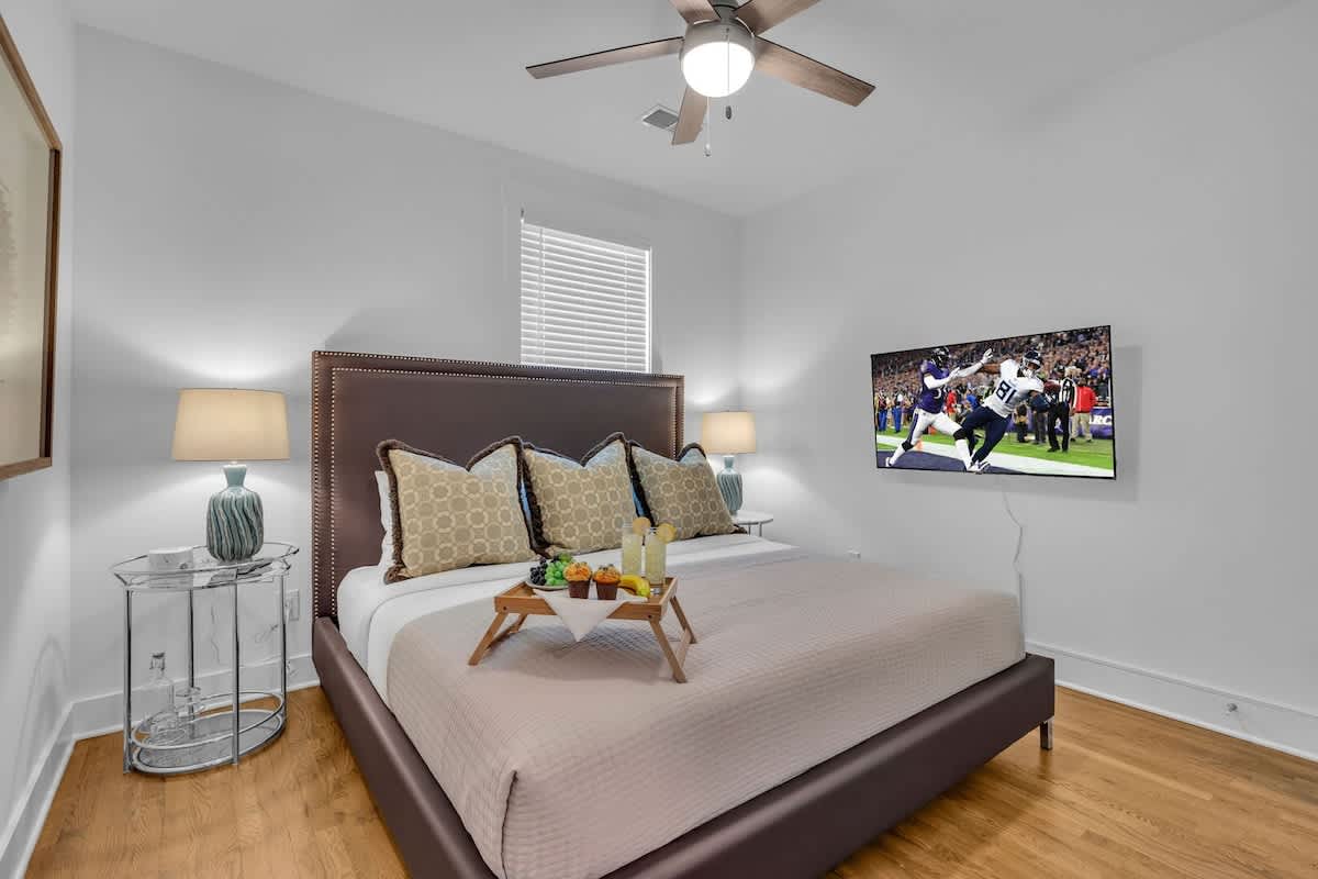 The primary Bedroom features a King Bed with a closet and a Smart TV for entertainment.