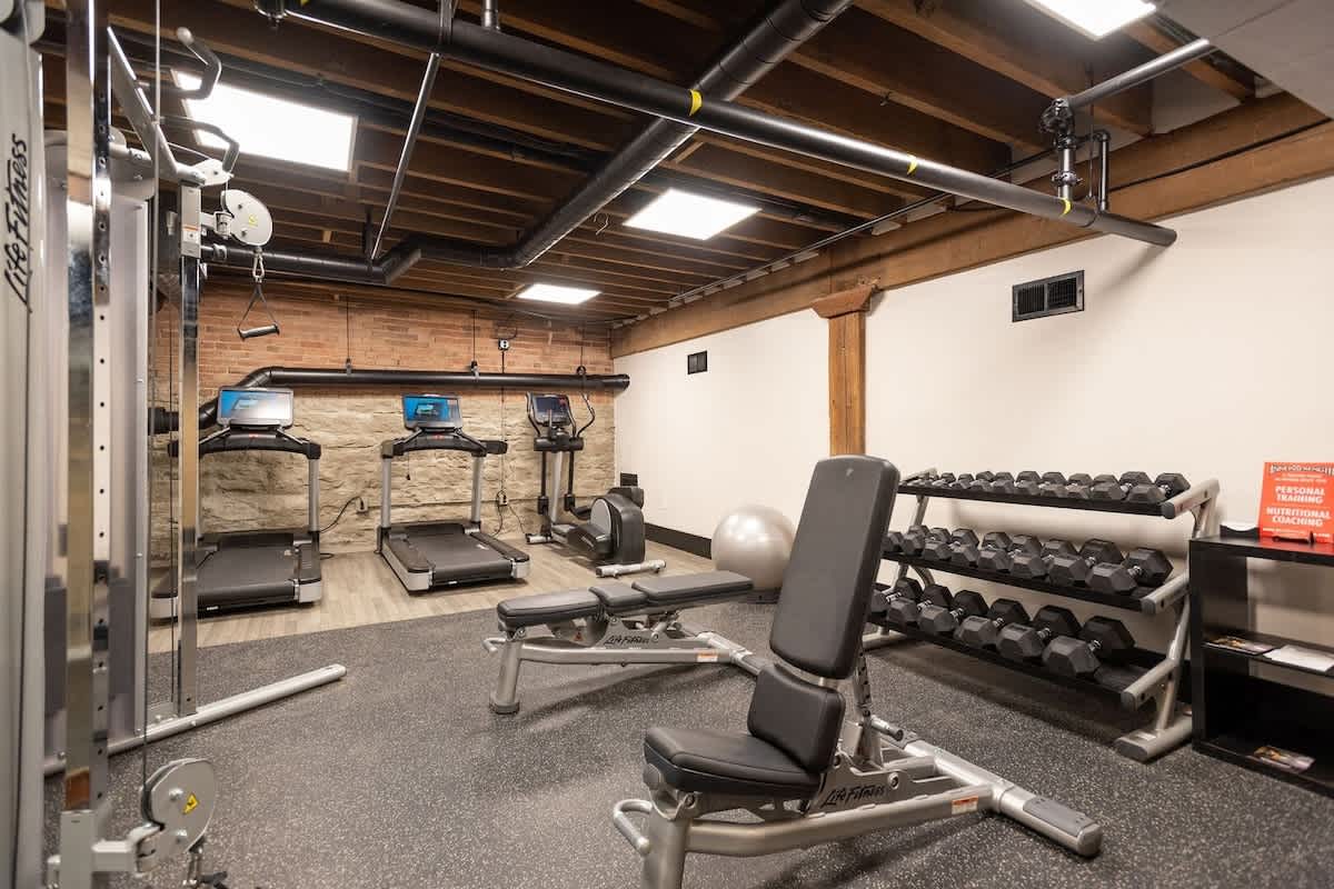 Communal Area: Gym offering a wide range of workout equipment.