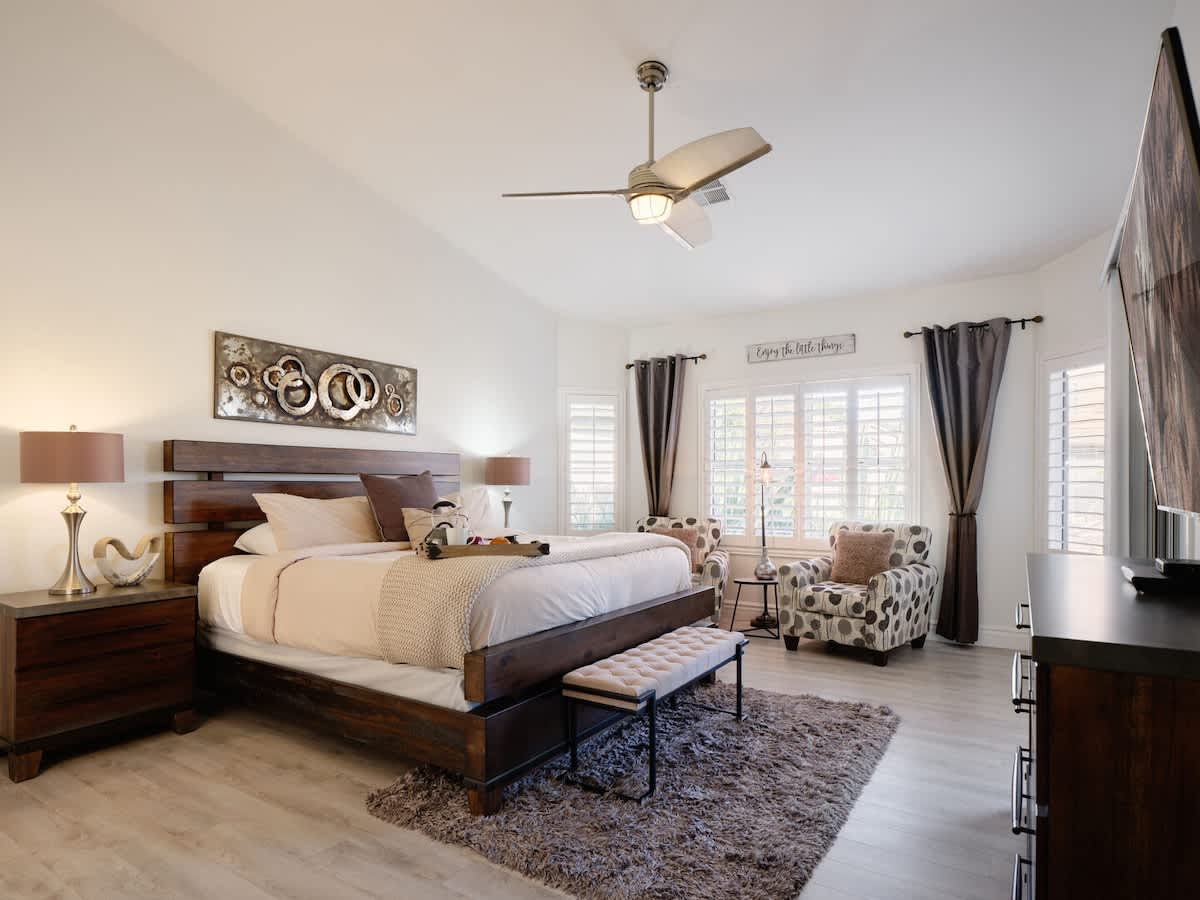 Primary bedroom with king bed, smart tv and ensuite bathroom.