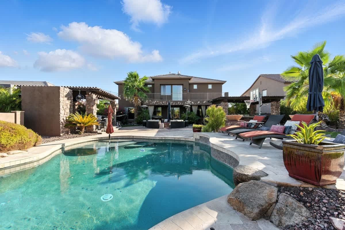 Inviting, sparkling, heated optional pool, lounge areas, and lounge chairs.