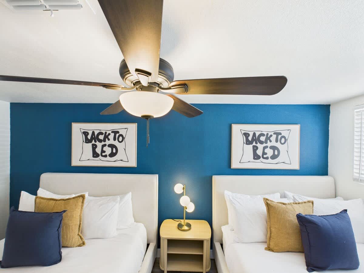 2nd bedroom with two Queen beds and closet space.