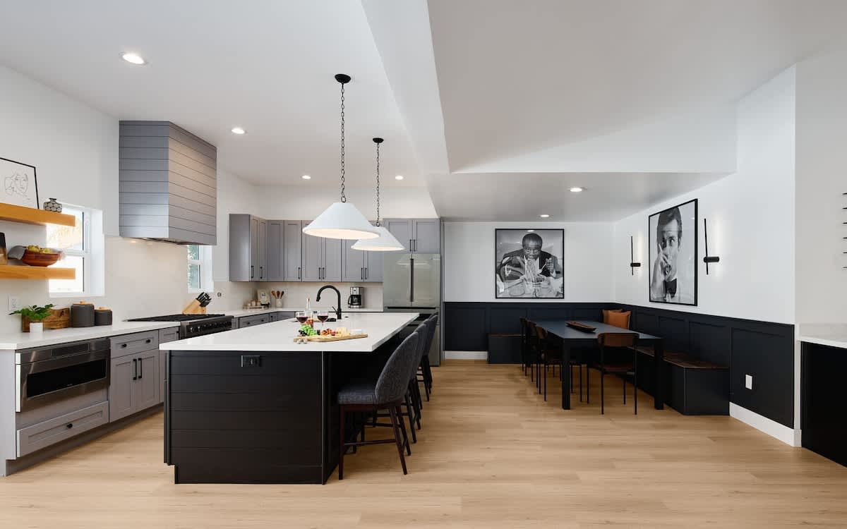 Fully Equipped Kitchen boasting brand-new stainless-steel appliances, ample cabinet / pantry storage and an oversized island offering ample counter space and bar seating.