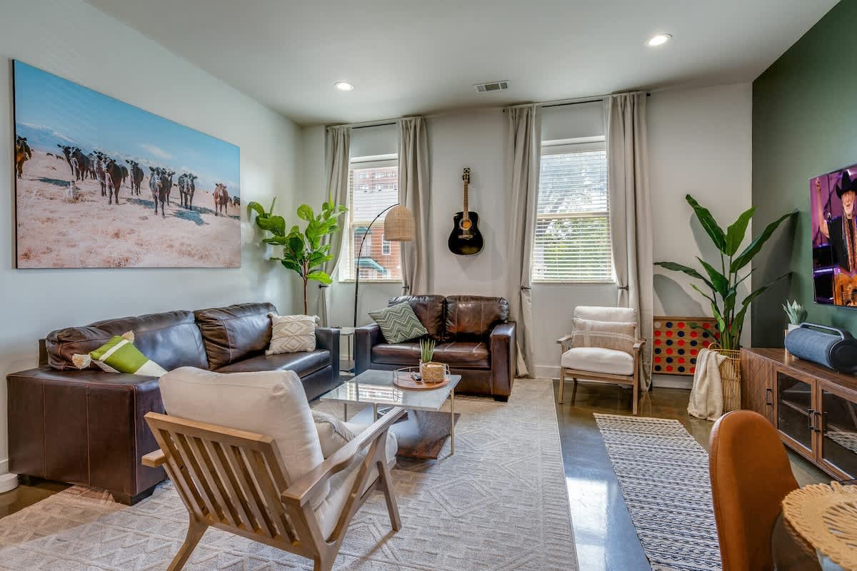 Bright and open living area with smart TV.