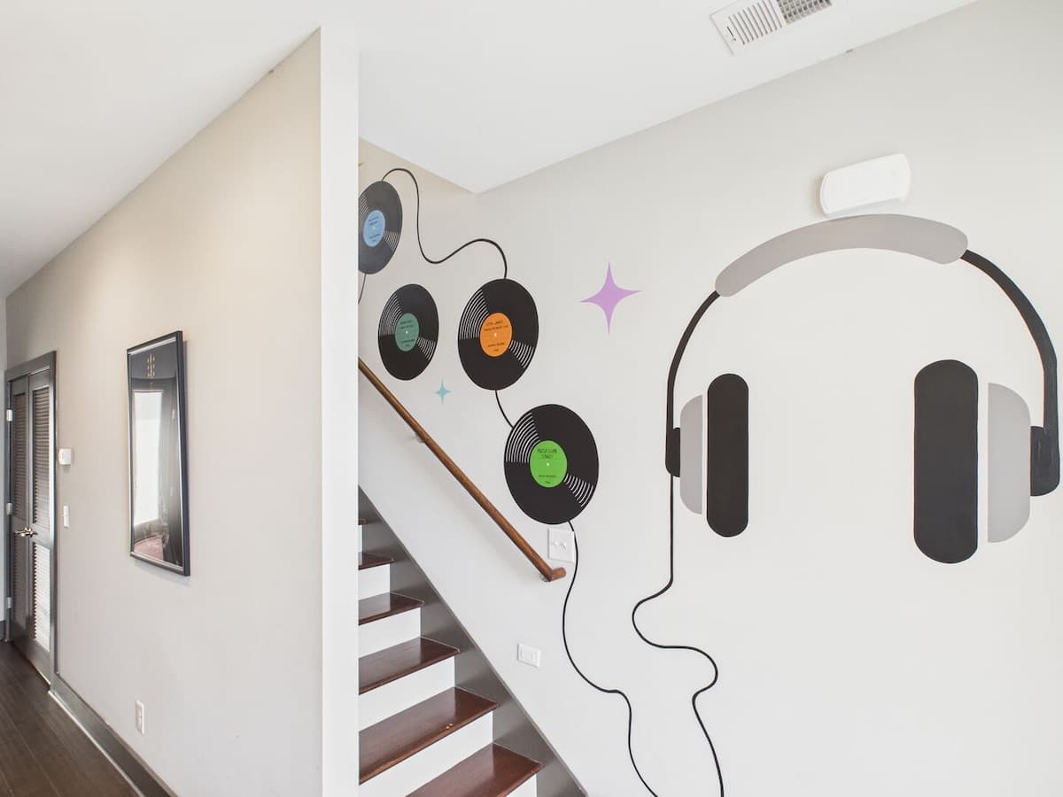 Eye-catching music-themed mural along the staircase.
