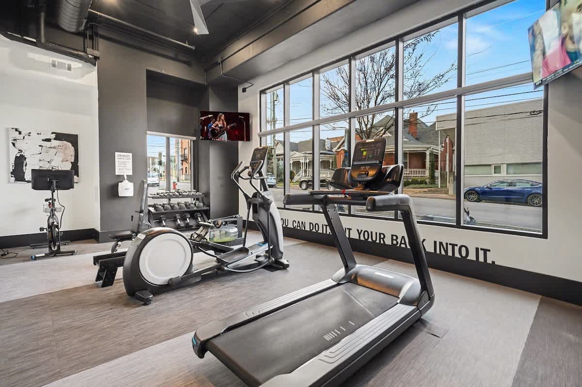 Communal Area: Gym offering a wide range of workout equipment and a smart TV.