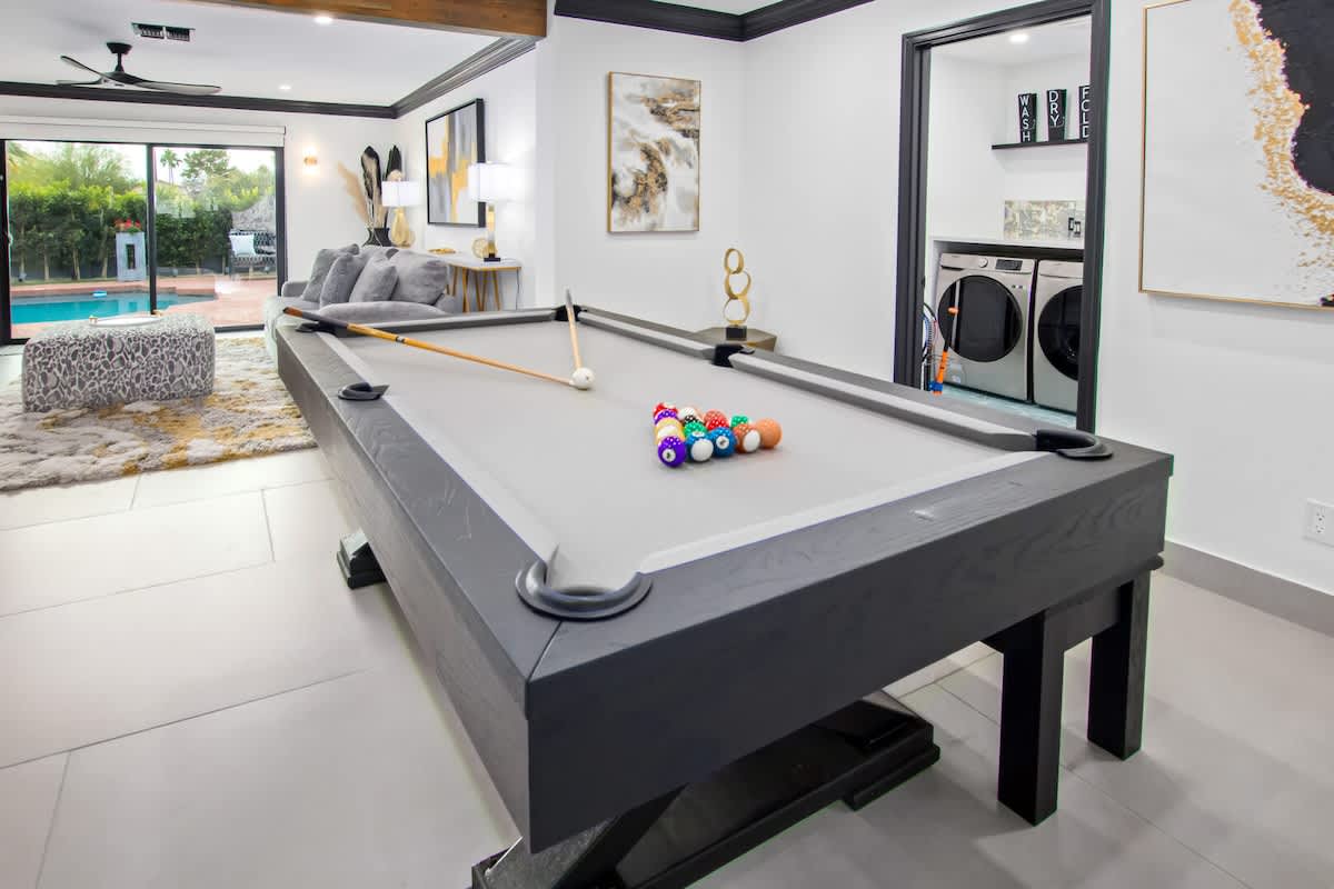Dining area with seating for 6. Bonus: The dining table converts into a pool table.