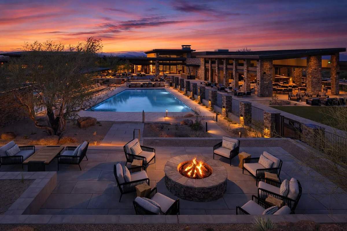 Communal Area: Resort-style pools and spa with outdoor seating, fire pit, and cafe