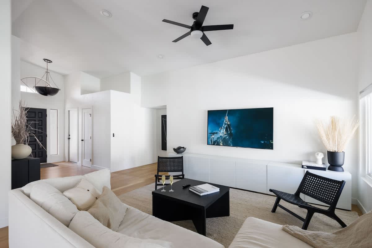 Cozy open spaced living room with smart tv