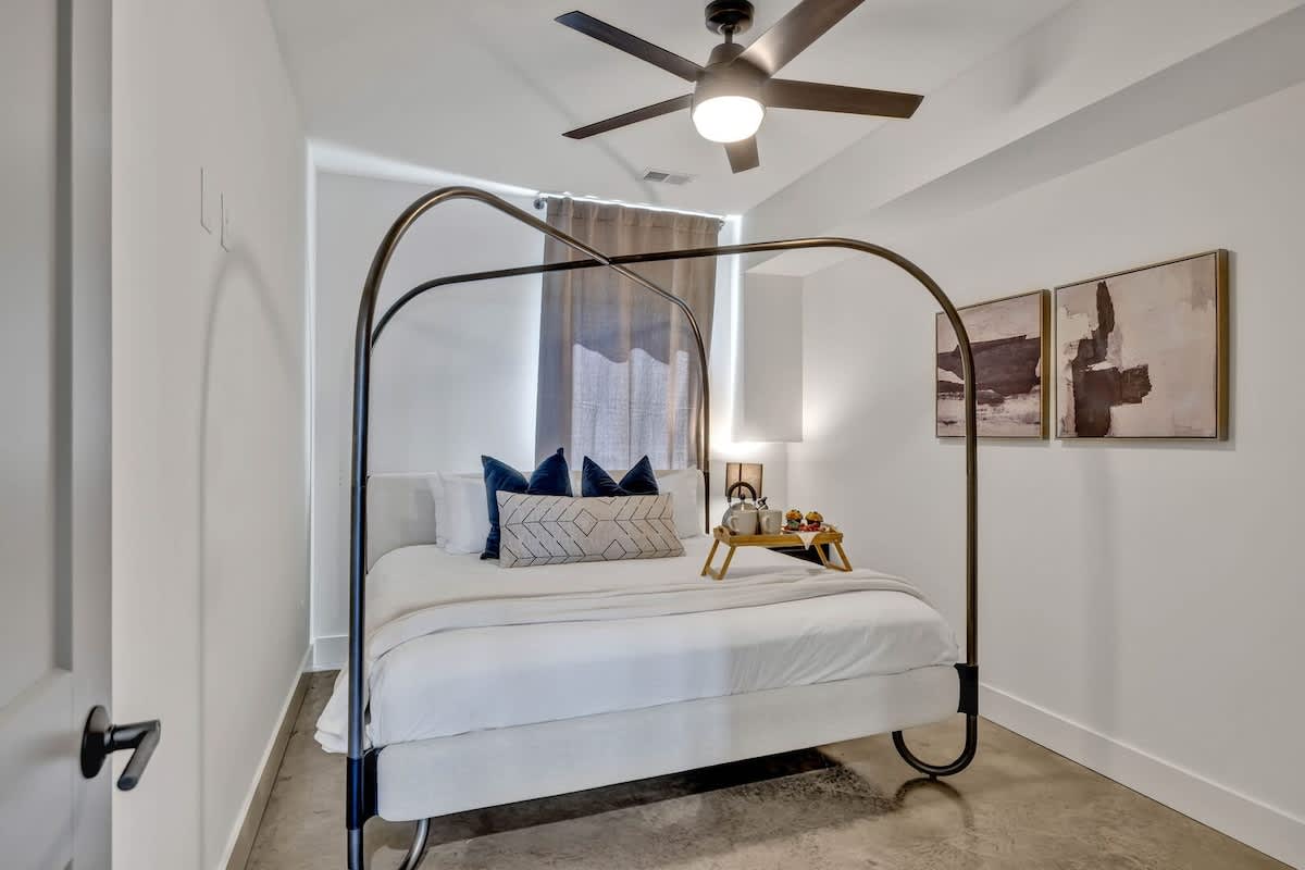 Primary Bedroom with King bed, closet space, and modern furnishings.