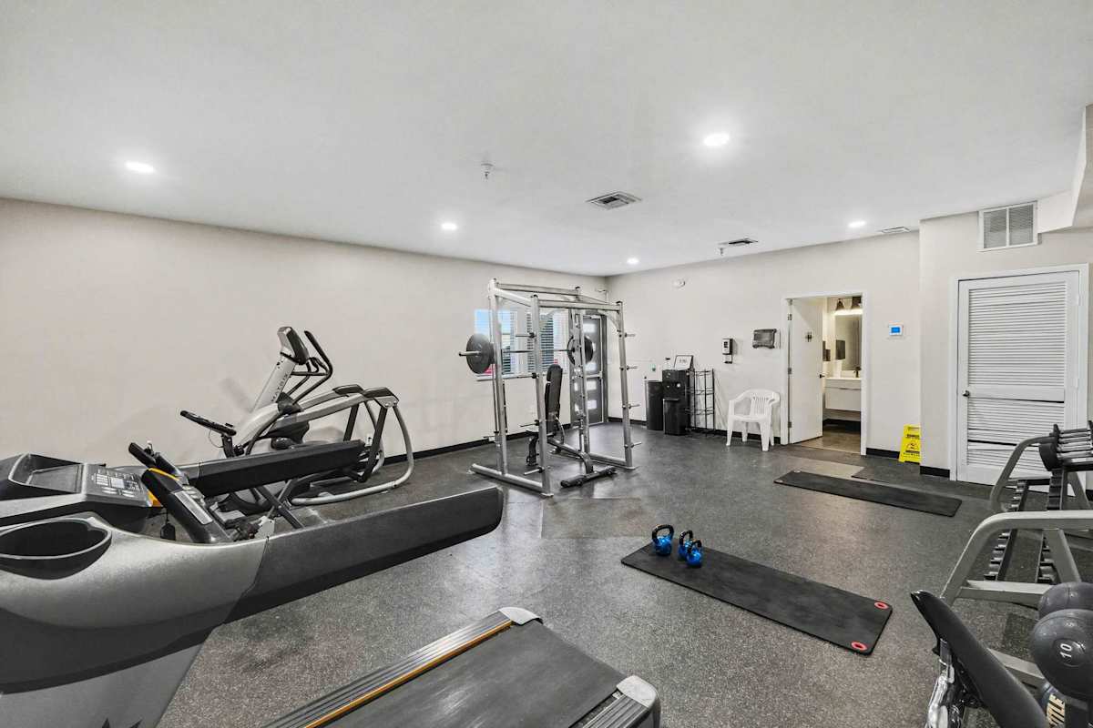 Community fitness center featuring cardio equipment, free weights, and strength-training machines, making it easy to stay active during your stay.