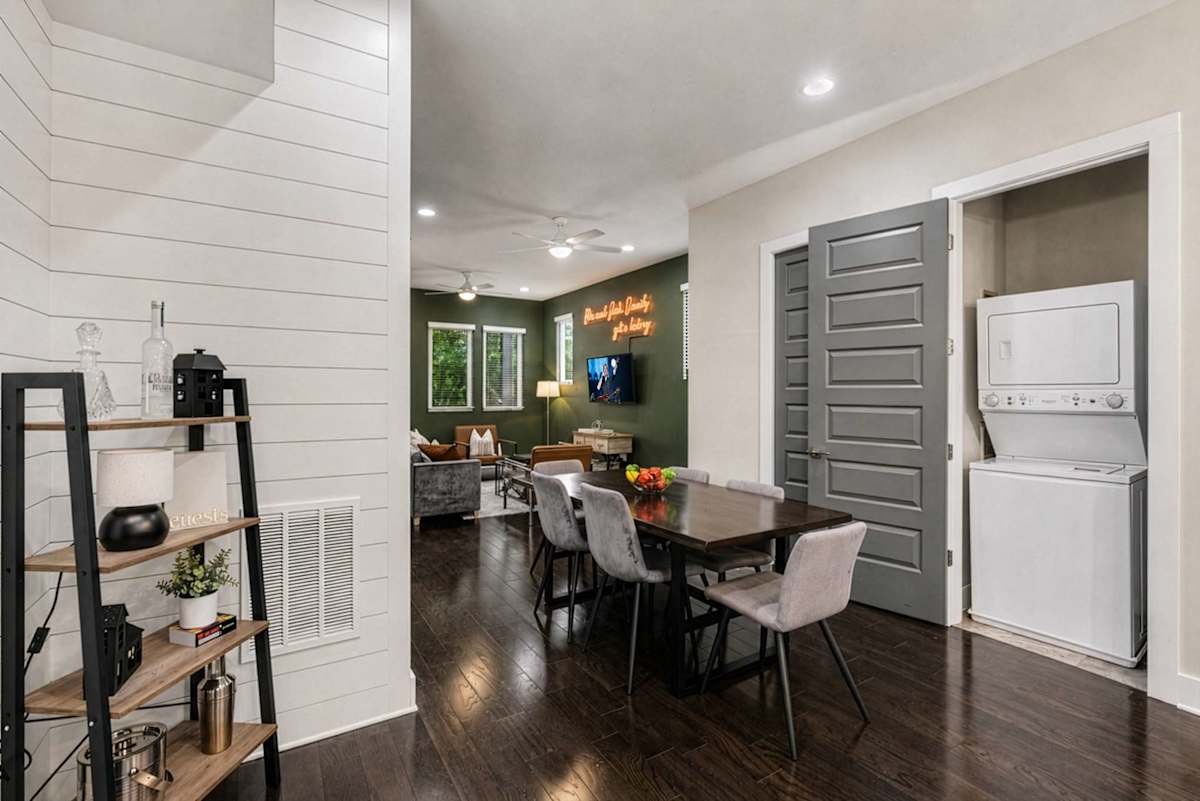 Gather in style around the spacious dining table, comfortably seating six guests for meals or lively conversations. (2nd Floor)