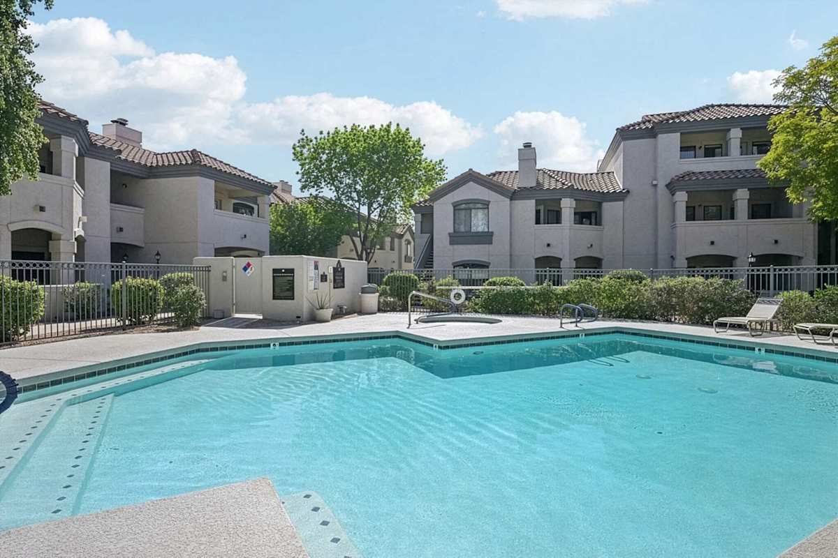 Cool off in the sparkling community pool, complete with an adjacent bubbling spa — the perfect spot to relax poolside after a day of sightseeing in the Arizona sun.