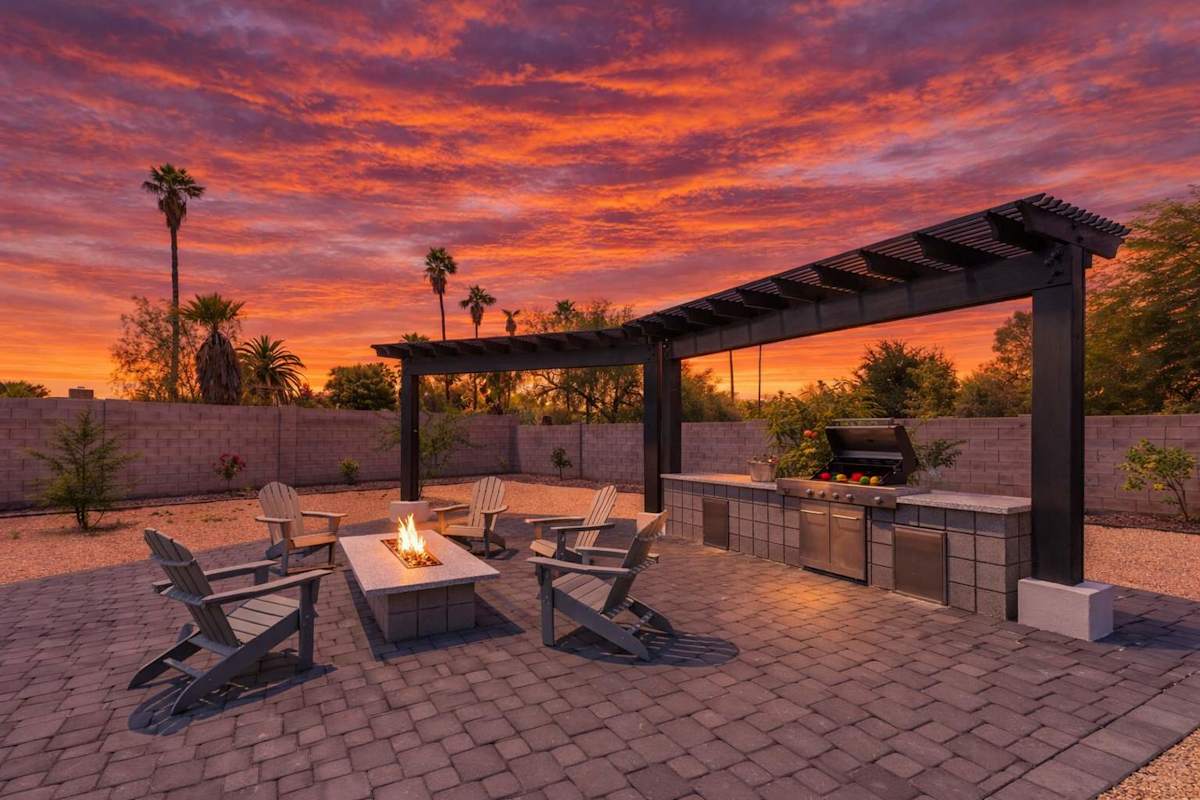 Backyard Resort featuring a sparkling blue oasis and spa, BBQ grill, Covered Patio w/ Outdoor Dining, fire pit and a Sports Court!