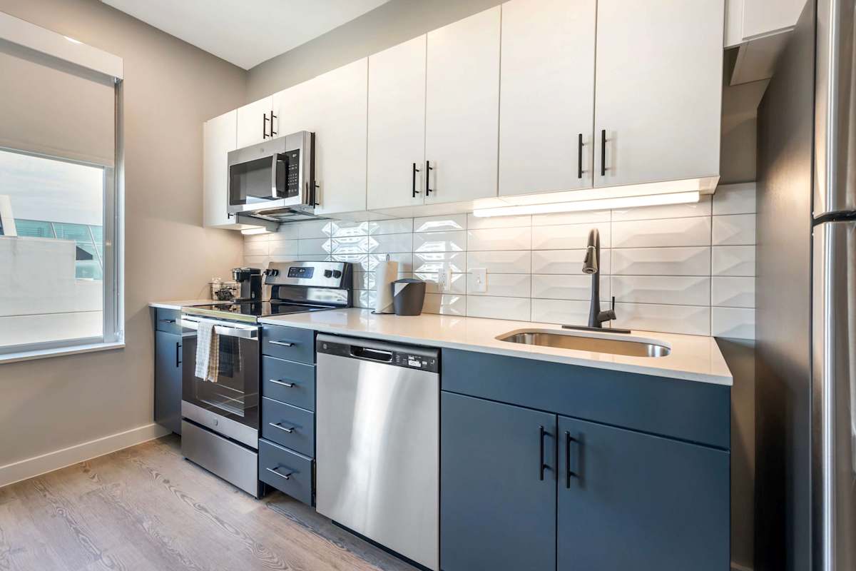 Kitchen featuring sleek stainless steel appliances and everything needed to prepare meals, snacks, or your morning coffee with ease.