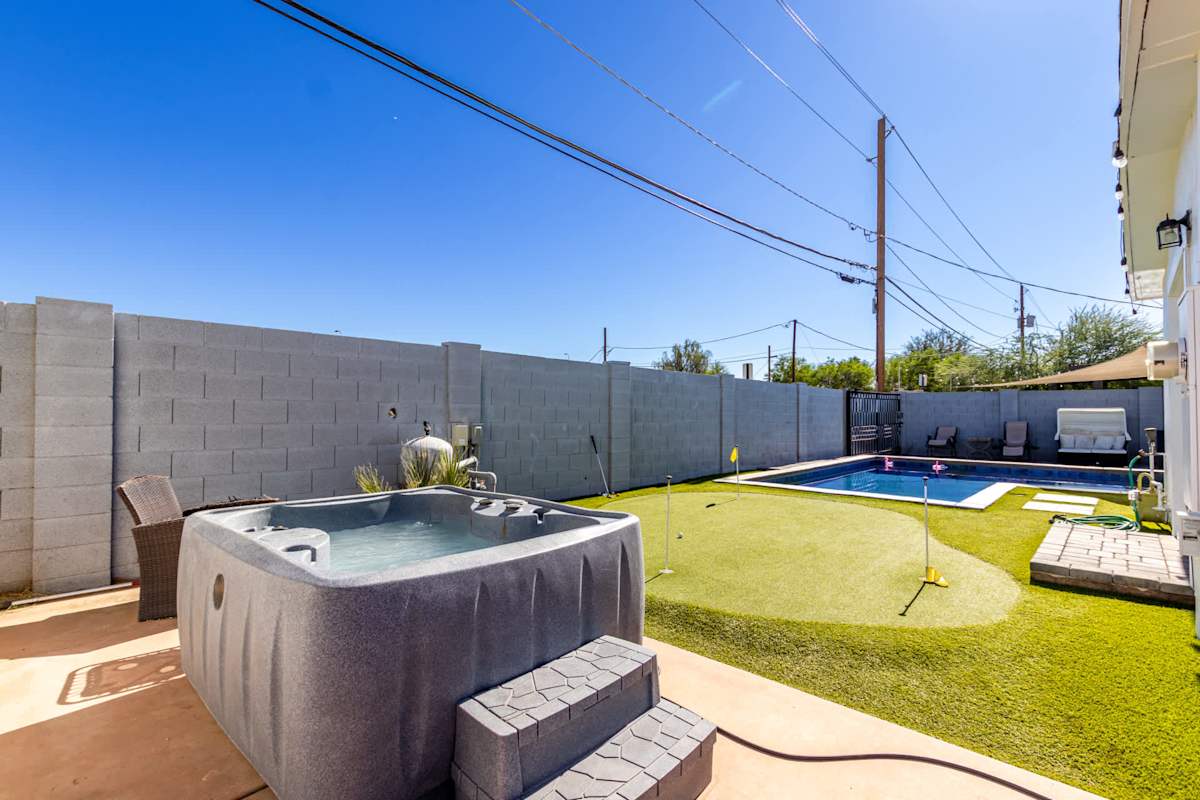 Unwind in the bubbling hot tub just steps from the pool.