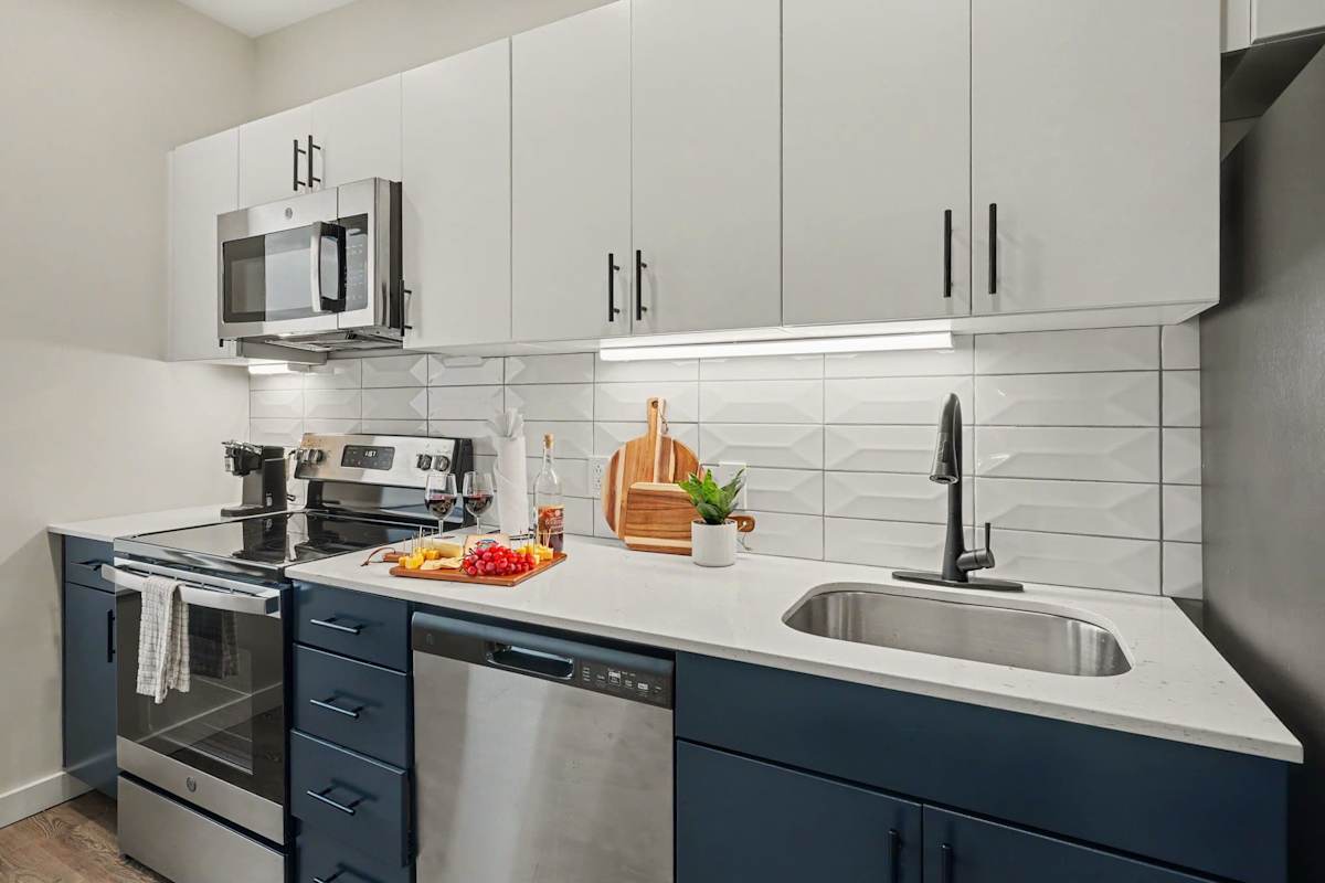 Kitchen featuring sleek stainless steel appliances and everything needed to prepare meals, snacks, or your morning coffee with ease.